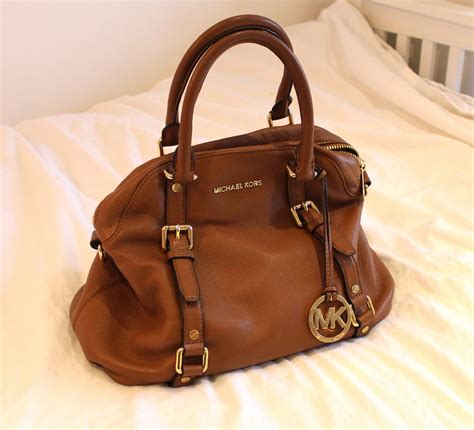 michael kors used purses for sale|More.